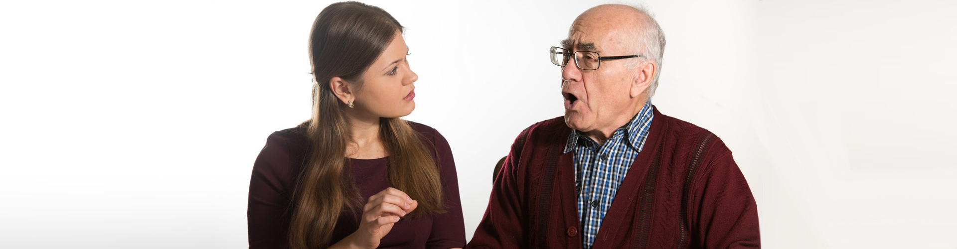 a consultant and an elderly man chatting